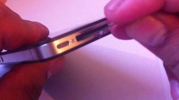 debris lodged in charging port