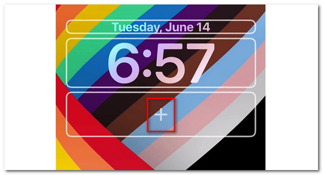 érintse meg a plusz ikont az iPhone zárolási képernyőjén