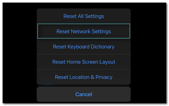 elija el botón Restablecer configuración de red