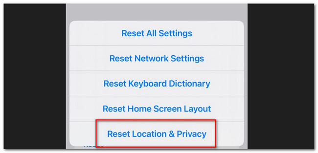 appuyez sur le bouton de réinitialisation de l'emplacement et de la confidentialité