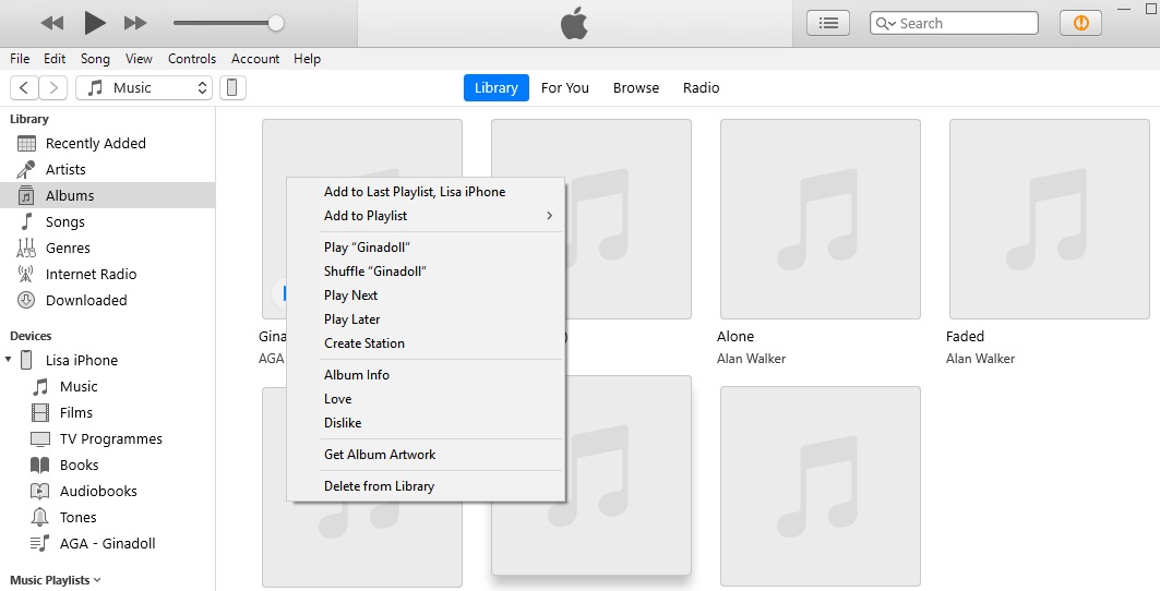 how to add music to iphone from different itunes library
